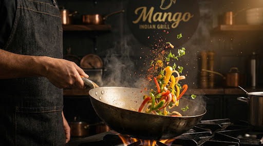 Chef's hands tossing fresh ingredients in a wok